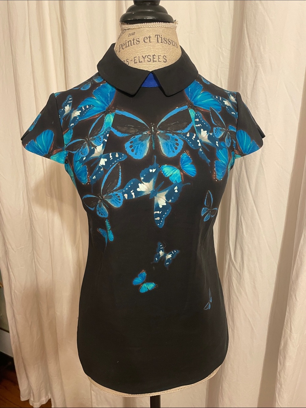 Ted Baker London Black collared Blouse with Blue Butterfly Print, zip clo size 1